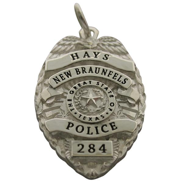 Custom New Braunfels TX Police Officer badge pendant in sterling silver with black enamel text.