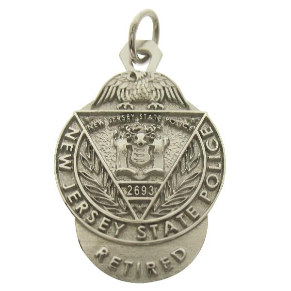 Custom New Jersey State Police retired badge pendant in 10k white gold with all standing letter text and 3D detail.