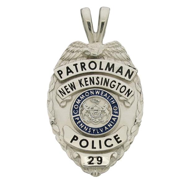 Custom New Kensington Police Patrolman badge memorial pendant in sterling silver with blue and black enamel and 'Y' bail.