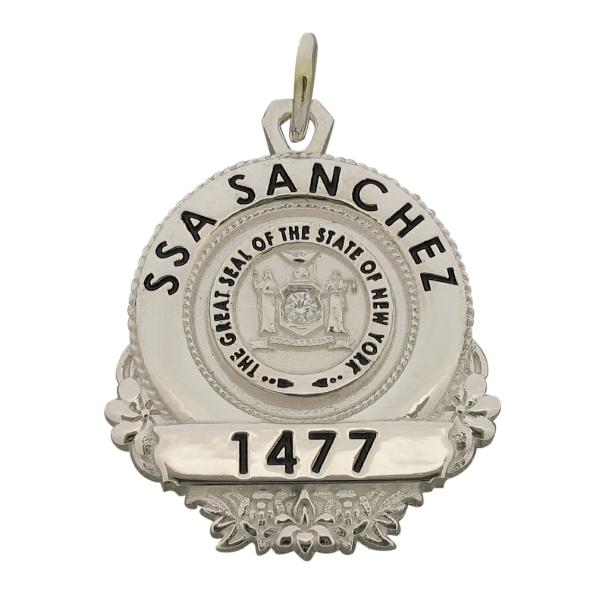 Custom New York School Security Officer badge pendant in sterling silver with black enamel and diamond.