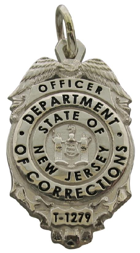 Custom New Jersey Department of Corrections (DOC) badge pendant in sterling silver with black enamel text.