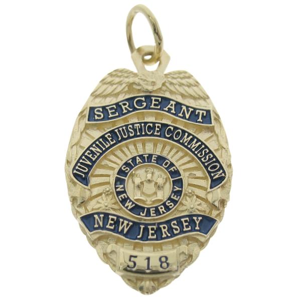 Custom New Jersey Juvenile Justice Commission Sergeant badge pendant in 14k yellow gold with blue enamel.