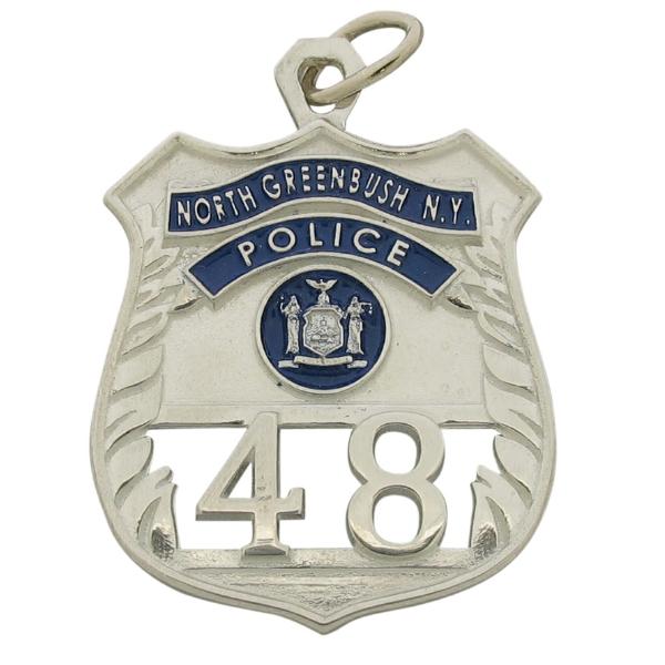 Custom North Greenbush NY Police Officer badge pendant in sterling silver with blue enamel.