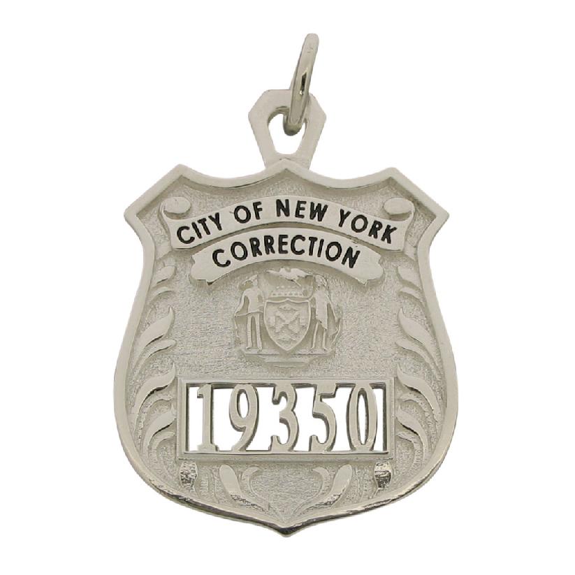 Custom New York City Corrections Officer badge pendant in sterling silver with cutout numbers and black enamel ribbon text.