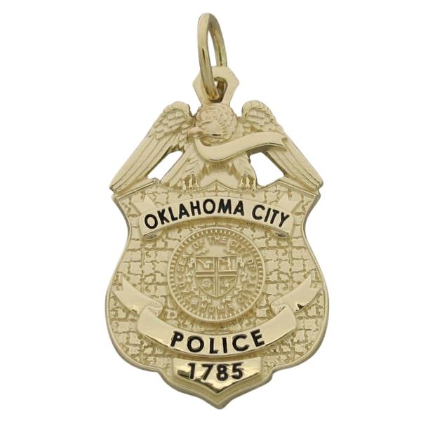 Custom Oklahoma City OK Police Officer badge pendant in 10k yellow gold with black enamel.