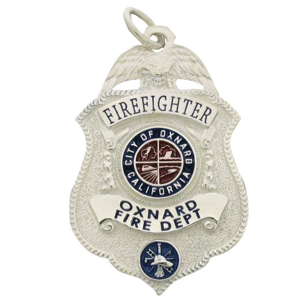 Custom Oxnard CA Firefighter badge pendant in sterling silver with blue and red enamel.