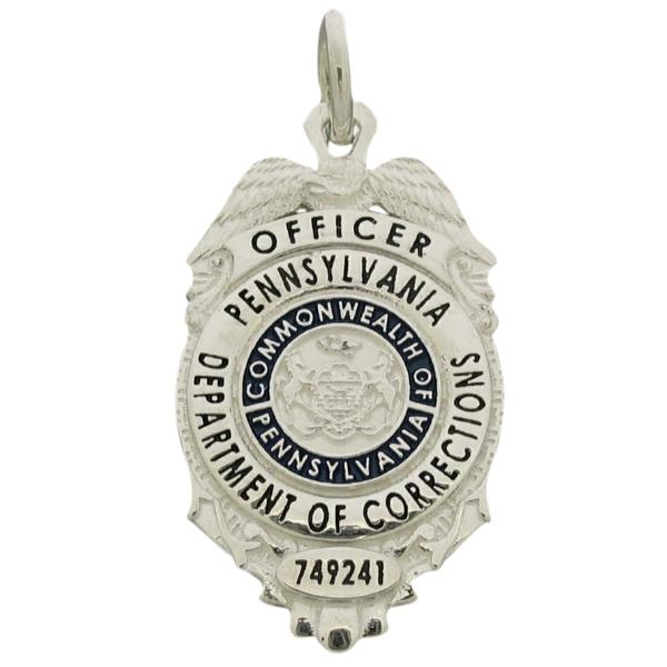 Custom Pennsylvania Department of Corrections Officer pendant in sterling silver with blue and black enamel.