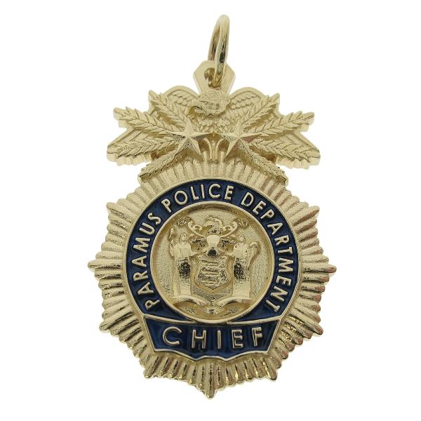 Custom Paramus NJ Police Chief badge pendant in 14k yellow gold with standing letter detail and blue enamel.