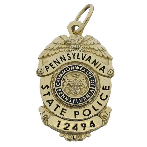 Custom Pennsylvania State Police badge memorial pendant in sterling silver with gold plate and black and blue enamel.