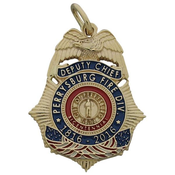 Custom Perrysburg OH Fire Division Deputy Chief badge pendant in 10k yellow gold with red, white, and blue enamel.