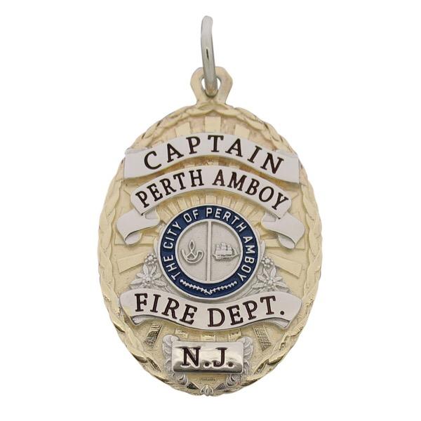 Custom Perth Amboy NJ Fire Captain badge pendant in 10k yellow gold with rhodium plated ribbons and seal, blue and black enamel.