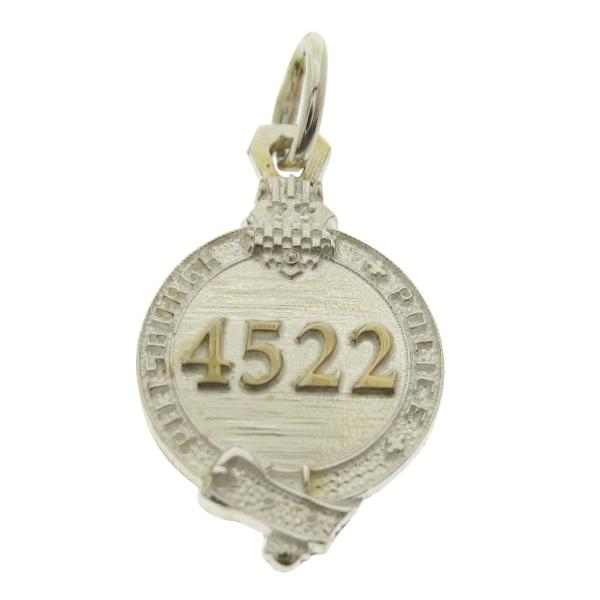 Custom Pittsburgh PA Police Officer badge charm in sterling silver with raised letters and gold plated badge number.
