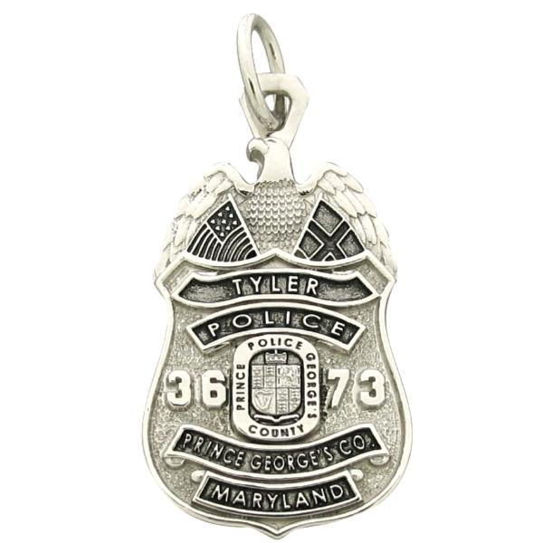 Custom Prince George's County MD Police Officer badge pendant in 10k white gold with antiqued highlights.