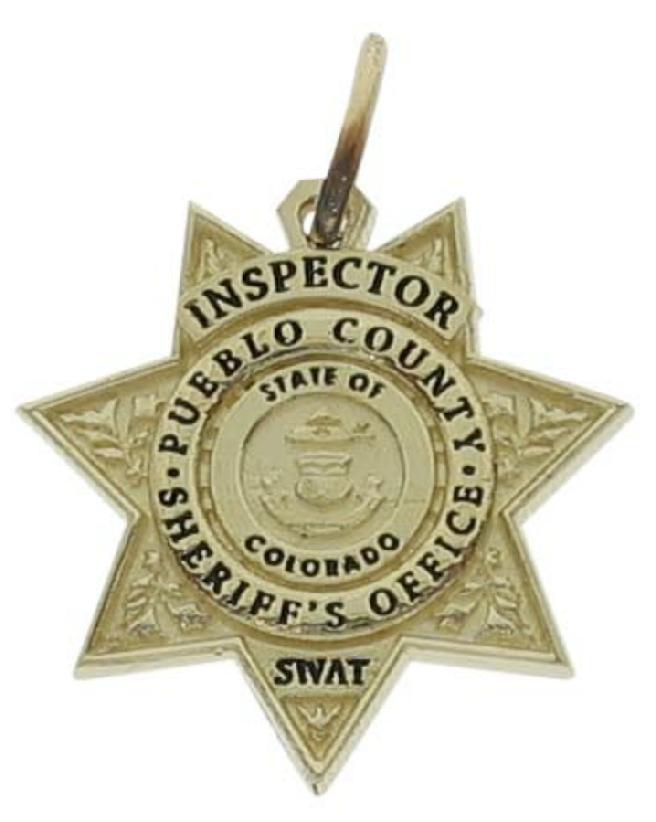 Custom Pueblo County, CO Sheriff's Inspector SWAT badge pendant in 10k yellow gold with black enamel text.