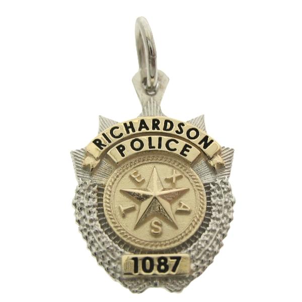 Custom Richardson TX Police badge pendant in 10k yellow gold with rhodium plate two tone finish and black enamel text.