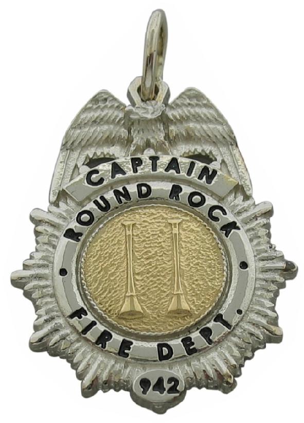 Custom Round Rock, TX Fire Captain badge pendant in 10k white gold with yellow gold plated center seal and black enamel text.