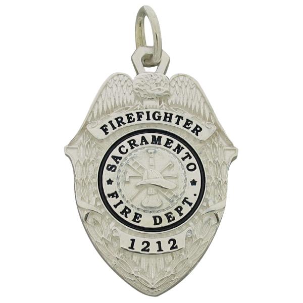 Custom Sacramento CA Firefighter badge pendant in sterling silver with black enamel.