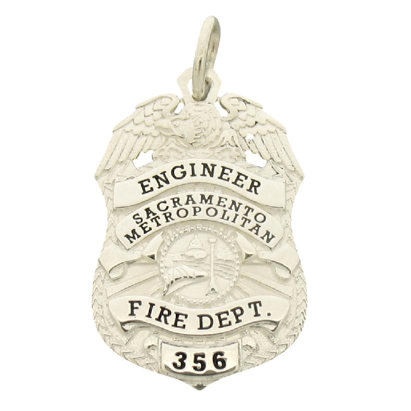Custom Sacramento Metropolitan CA Fire Engineer badge pendant in sterling silver with black enamel.
