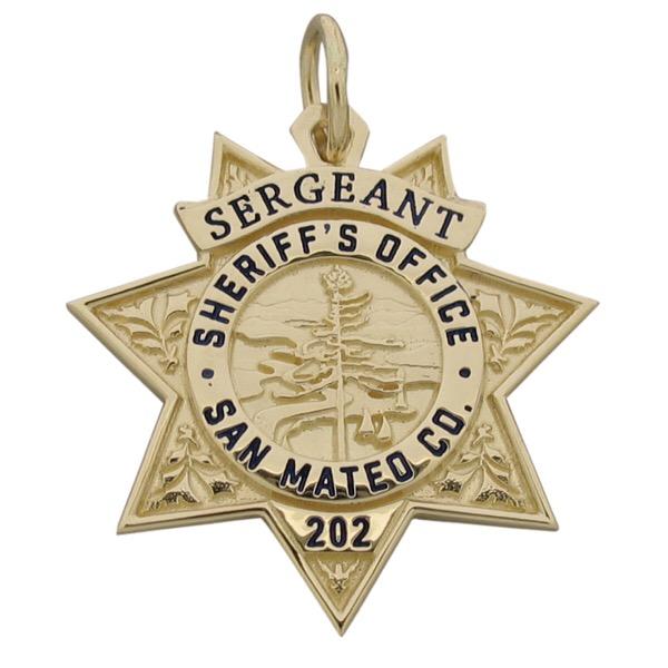 Custom San Mateo CA Sheriff's Sergeant badge pendant in 14k yellow gold with black enamel.