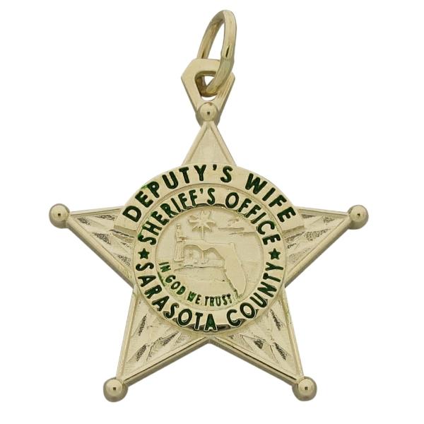 Custom Sarasota County FL Sheriff's Deputy badge pendant in 10k yellow gold with green enamel.