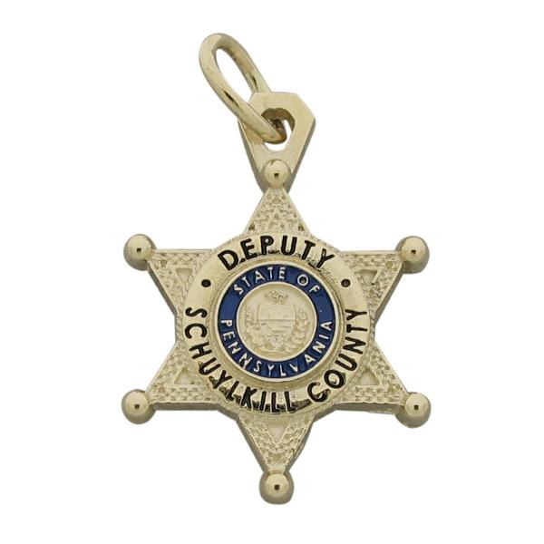 Custom Schuylkill County PA Sheriff's Deputy badge pendant in 10k yellow gold with blue and black enamel and standing letter seal bezel.