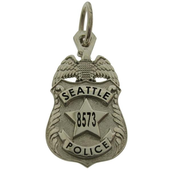 Custom Seattle WA Police Officer badge pendant in 14k white gold with black enamel.