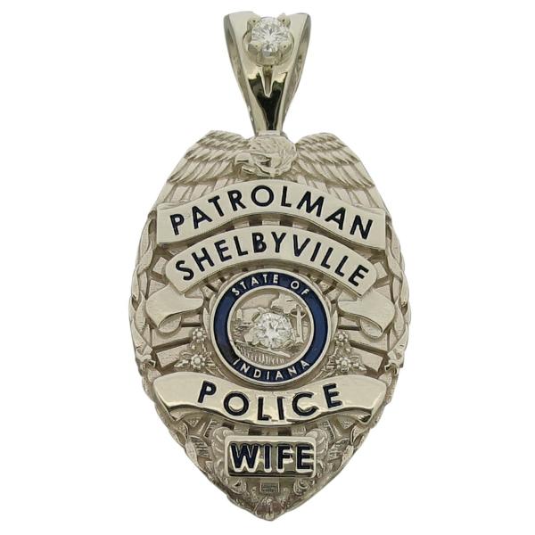 Custom Shelbyville IN Police Patrolman's Wife's badge pendant in 14k white gold with optional 'Y' bail, 0.04 ct. round brilliant diamond, and black and blue enamel.