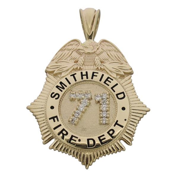Custom Smithfield Fire Department badge pendant in 14k yellow gold with badge number in 13 round brilliant diamonds.