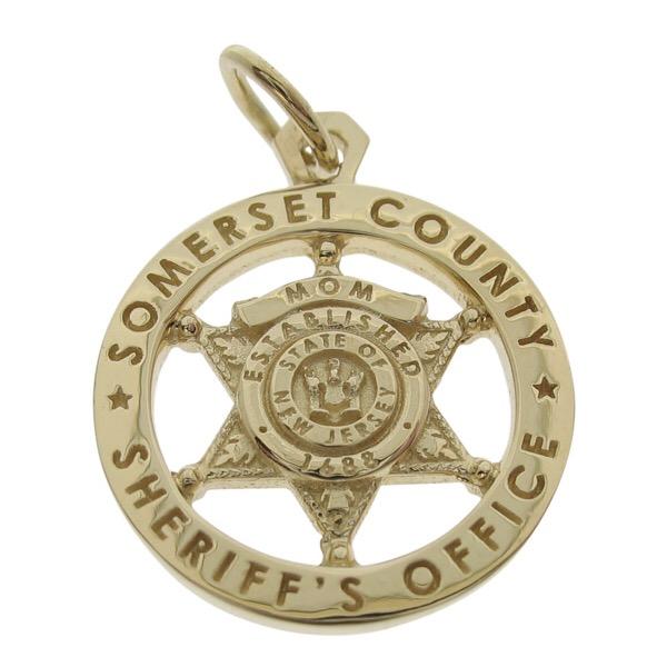 Custom Somerset NJ Sheriff's Office badge pendant in 14k yellow gold with no enamel in engraved text.