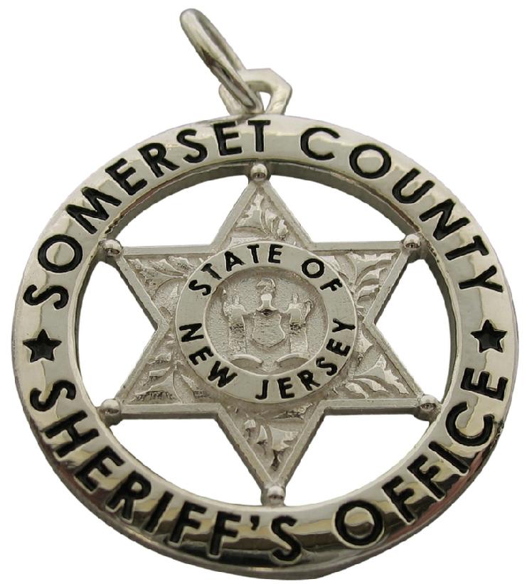 Custom Somerset NJ Sheriff Deputy badge pendant in sterling silver with black enamel text.