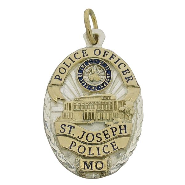 Custom St. Joseph MO Police Officer badge pendant in two tone sterling silver.