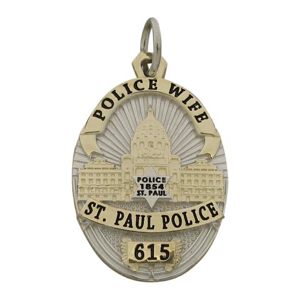 Custom Saint Paul MN Police Officer badge pendant in two tone sterling silver with black enamel.