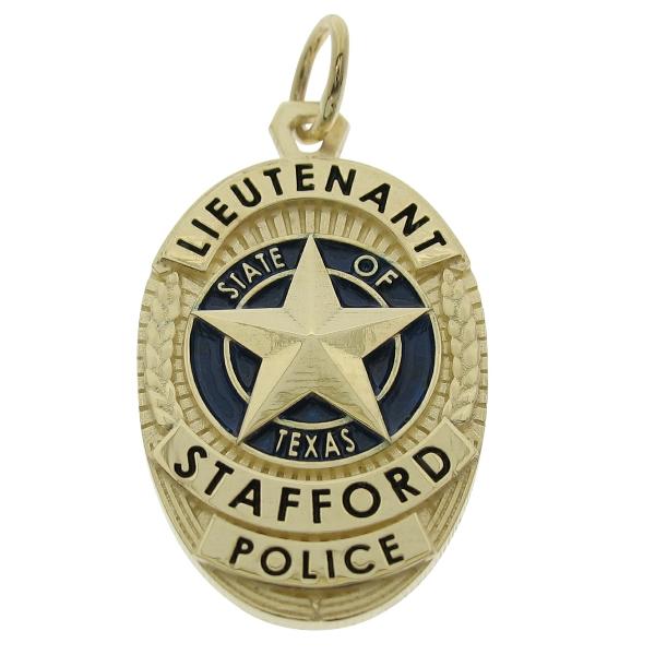 Custom Stafford TX Police Lieutenant badge pendant in 10k yellow gold with blue and black enamel and standing letter seal bezel.