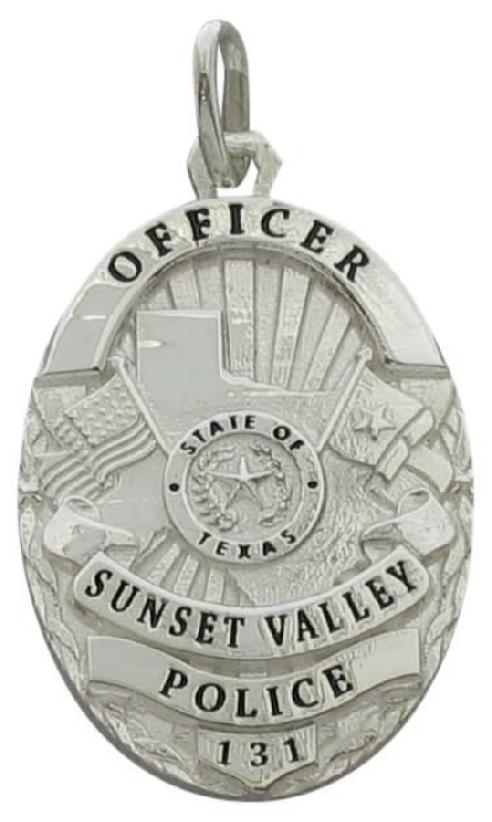 Custom Sunset Valley, TX Police Officer badge pendant in sterling silver with black enamel text.