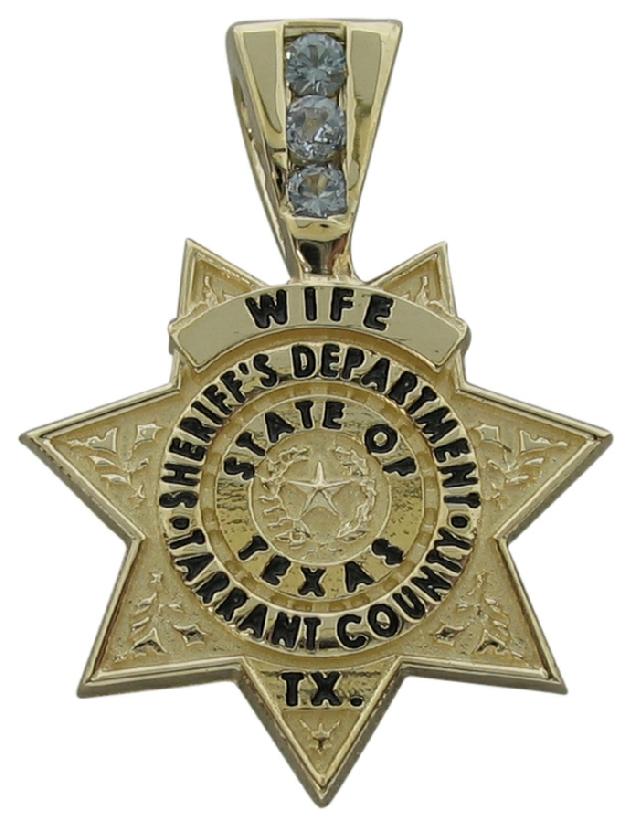 Custom Tarrant County, TX Sheriff's Wife badge pendant in 14k yellow gold with optional 3-stone bail with December birthstone and black enamel text.