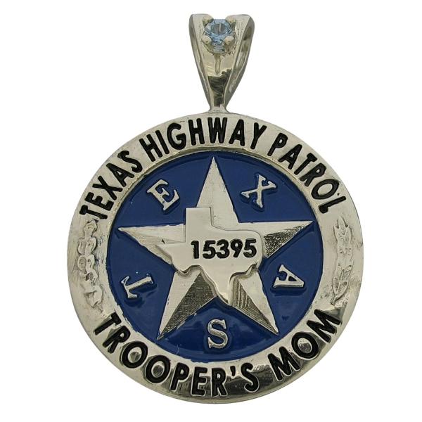 Custom Texas Highway Patrol Trooper's badge pendant in 10k white gold with a round cut Aquamarine birthstone set on a 'Y' bail. Features include black enamel text and blue enamel badge background.