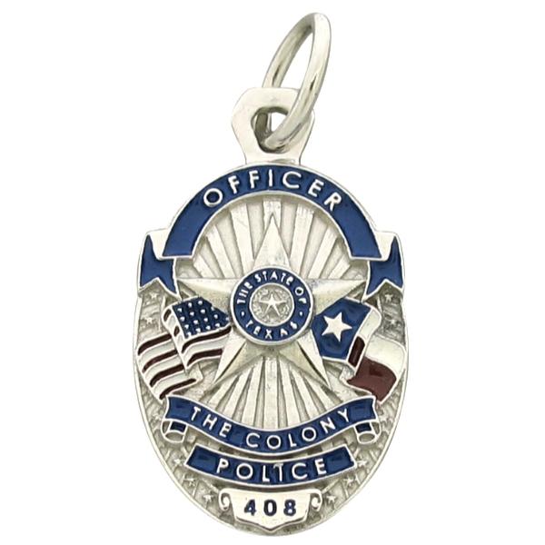 Custom The Colony TX Police Officer badge pendant in 10k white gold with red, white, and blue enamel flags, highlights, and text.