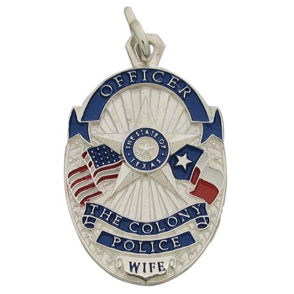 Custom The Colony TX Police Officer badge pendant in sterling silver with red, white, and blue enamel flags and text.