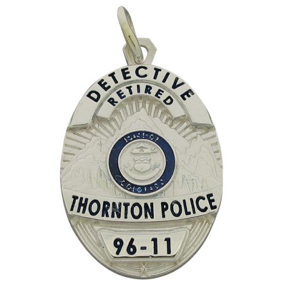 Custom Thornton CO Police Officer badge pendant in sterling silver.
