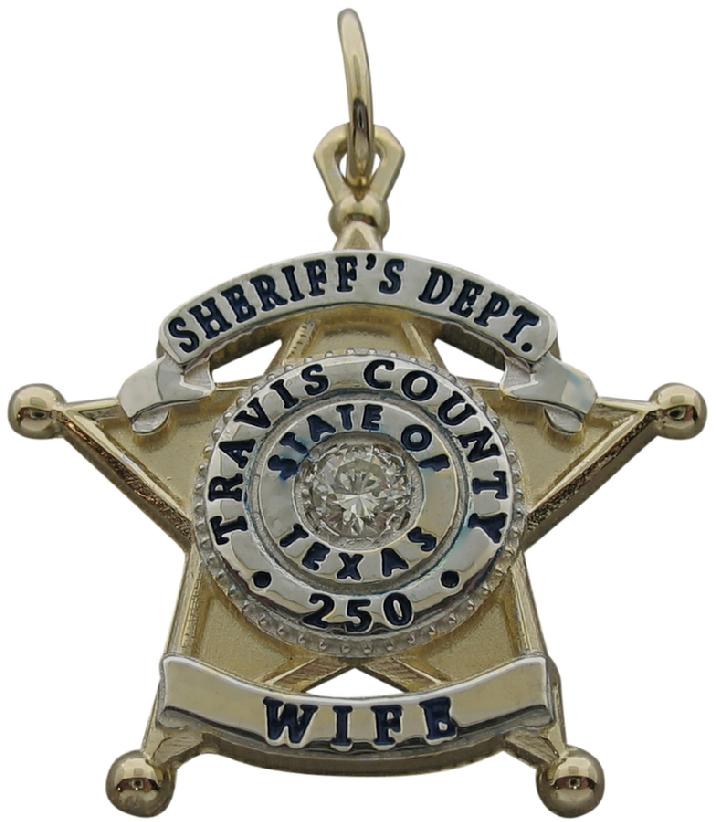 Custom Travis County, TX Sheriff Deputy badge pendant in 10k yellow gold with rhodium plated two tone highlights and an optional center diamond. Black enamel text.