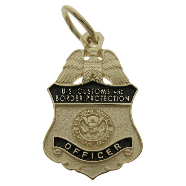 Custom U.S. Customs & Border Protection Officer's badge pendant in 10k yellow gold with black enamel.