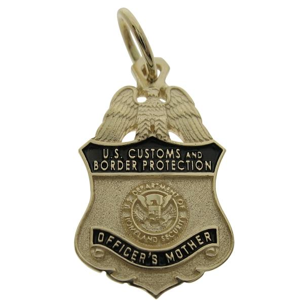 Custom U.S. Customs & Border Protection Officer's badge pendant in 10k yellow gold with black enamel.