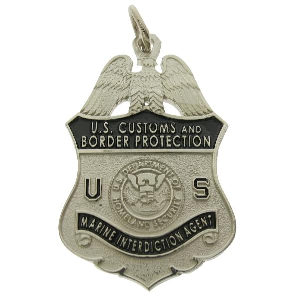 Custom U.S. Customs & Border Protection Agent badge pendant in 10k white gold with black enamel.