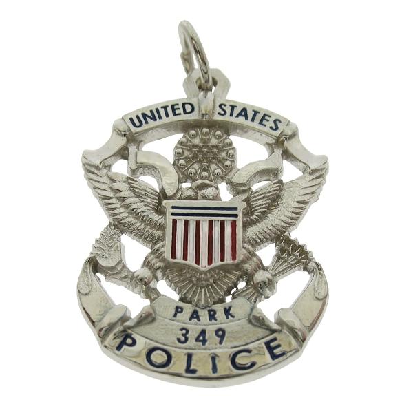 Custom U.S. Park Police Officer badge pendant in 10k white gold with red, blue, and white enamel.