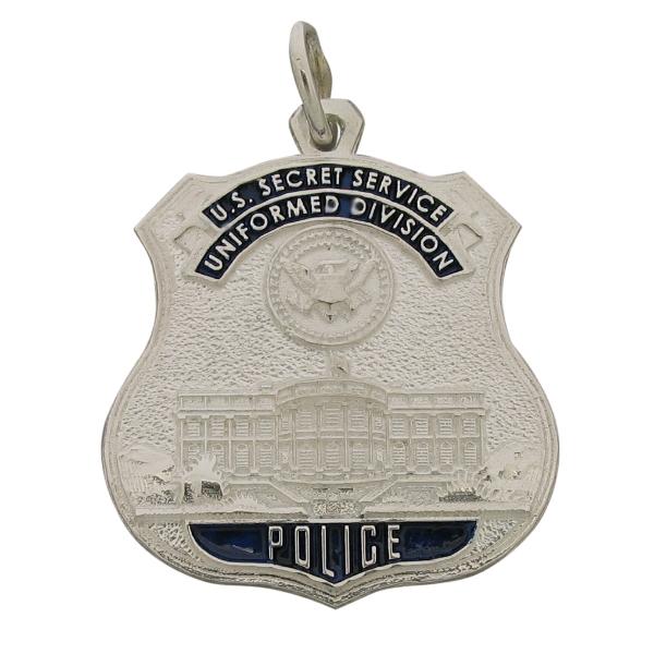 Custom U.S. Secret Service Uniformed Division Police Assistant Chief badge pendant in sterling silver with raised letter detail and blue enamel.