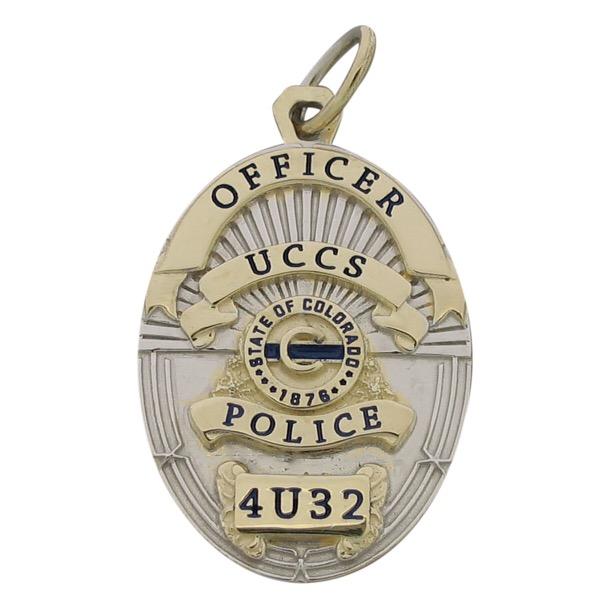 Custom University of Colorado, Colorado Springs Police Officer memorial badge pendant in 10k yellow gold with rhodium plated two tone.