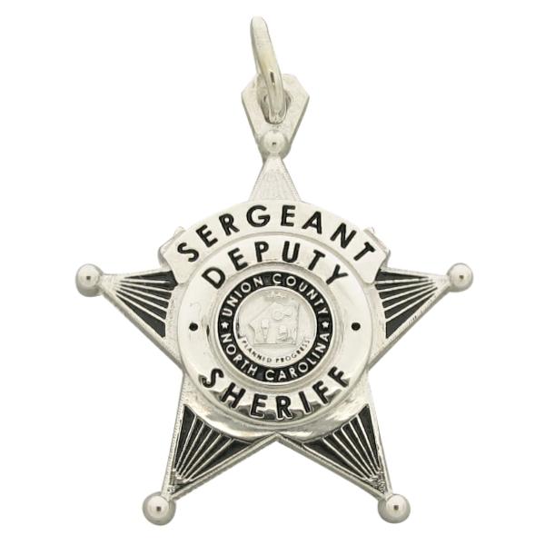 Custom Union NC Sheriff's Deputy memorial badge pendant in sterling silver with standing letter detail and black enamel.