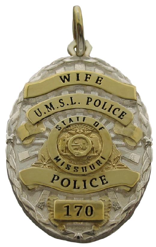 Custom University of Missouri Police Officer badge pendant in sterling silver with gold plated two tone finish and enamel text.