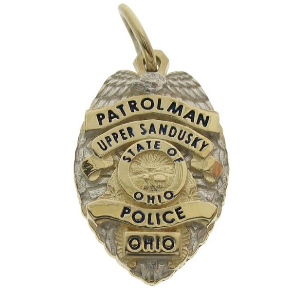 Custom Upper Sandusky OH Police Patrolman badge pendant in 14k yellow gold with rhodium plated two tone finish and black enamel text.