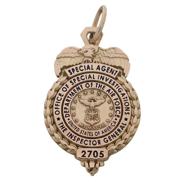 Custom U.S. Air Force Inspector General Special Agent badge pendant in 10k rose gold with blue enamel.
